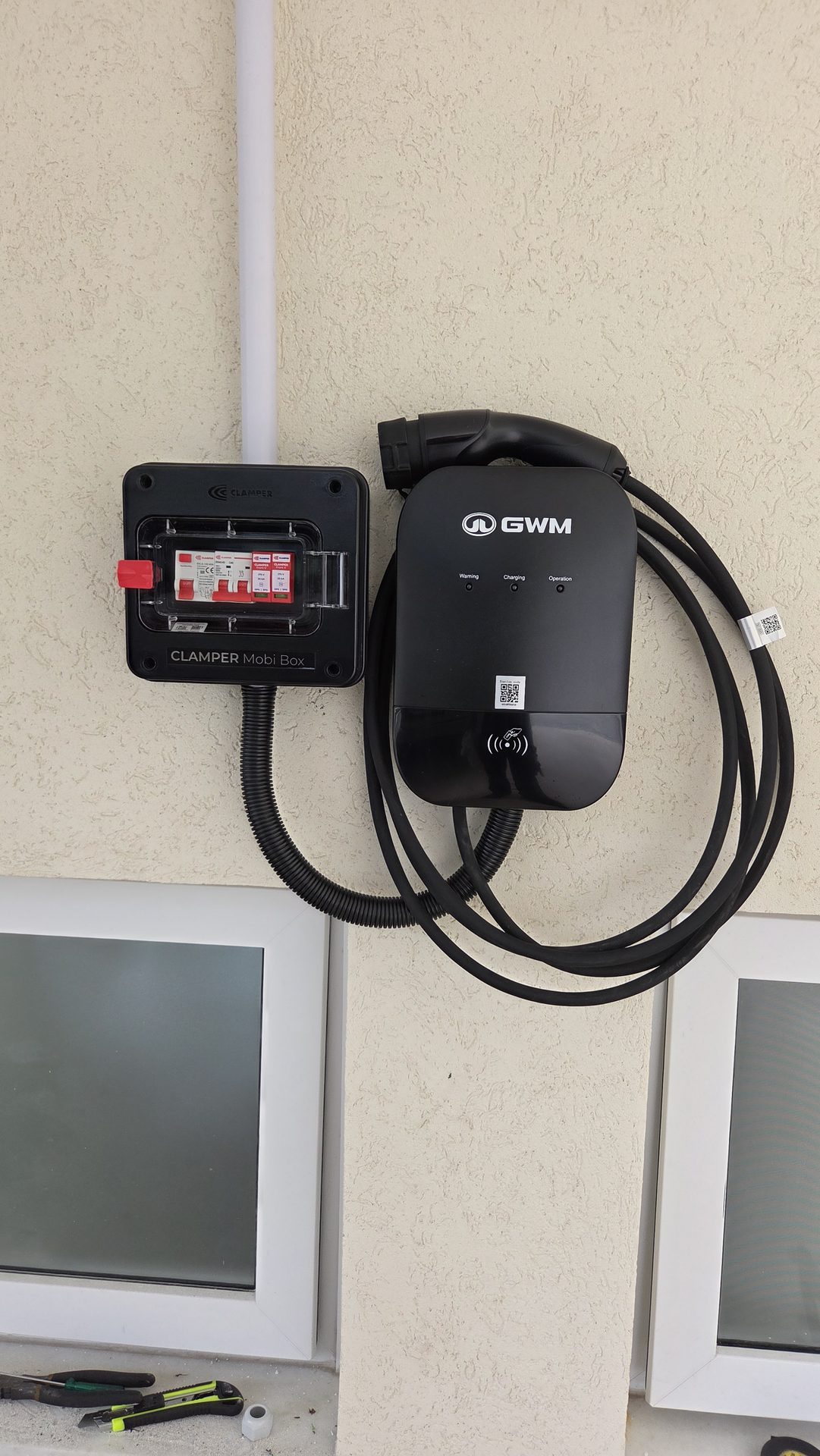 Carregador veicular GWM instalado em residência
